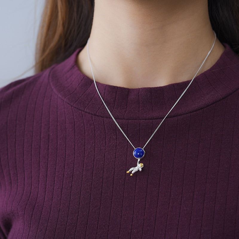 Astronaut Pendant  Metals Type: 925 Sterling Silver / 18K Gold plated Main Stone: Lapis Lazuli Item Weight: about 2.47g