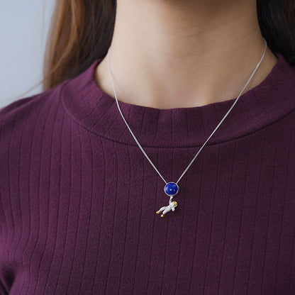 Astronaut Pendant  Metals Type: 925 Sterling Silver / 18K Gold plated Main Stone: Lapis Lazuli Item Weight: about 2.47g