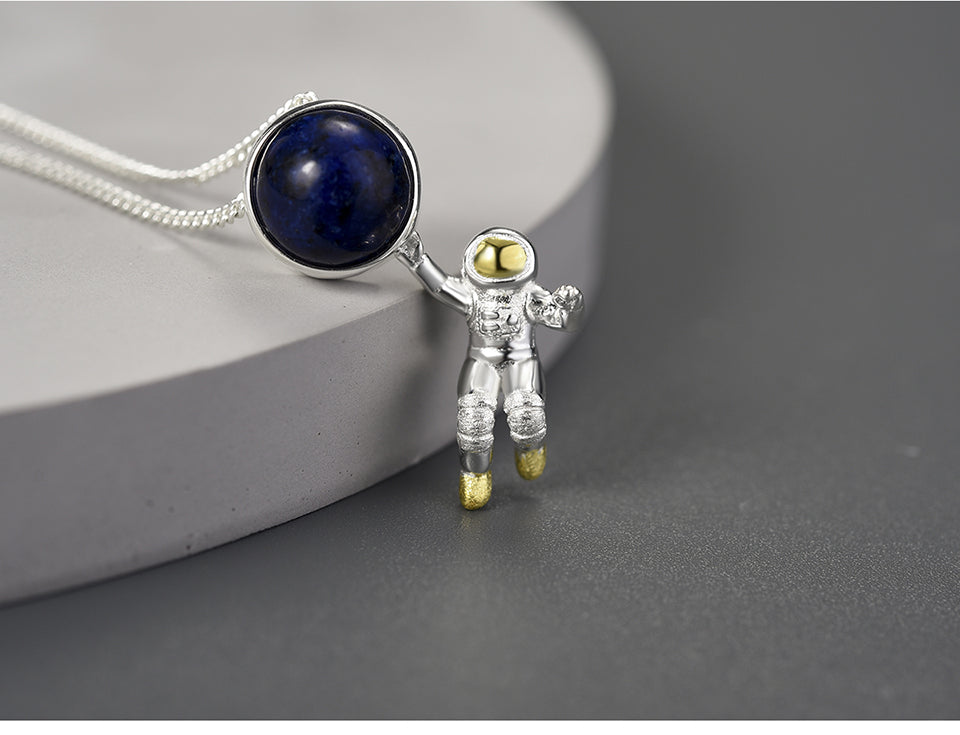 Astronaut Pendant  Metals Type: 925 Sterling Silver / 18K Gold plated Main Stone: Lapis Lazuli Item Weight: about 2.47g